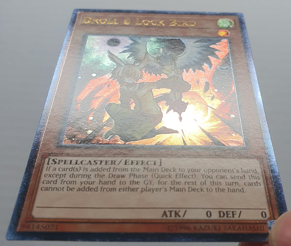 Yugioh Card - Droll & Lock Bird *Ultimate Rare* OP08-EN001 (NM)